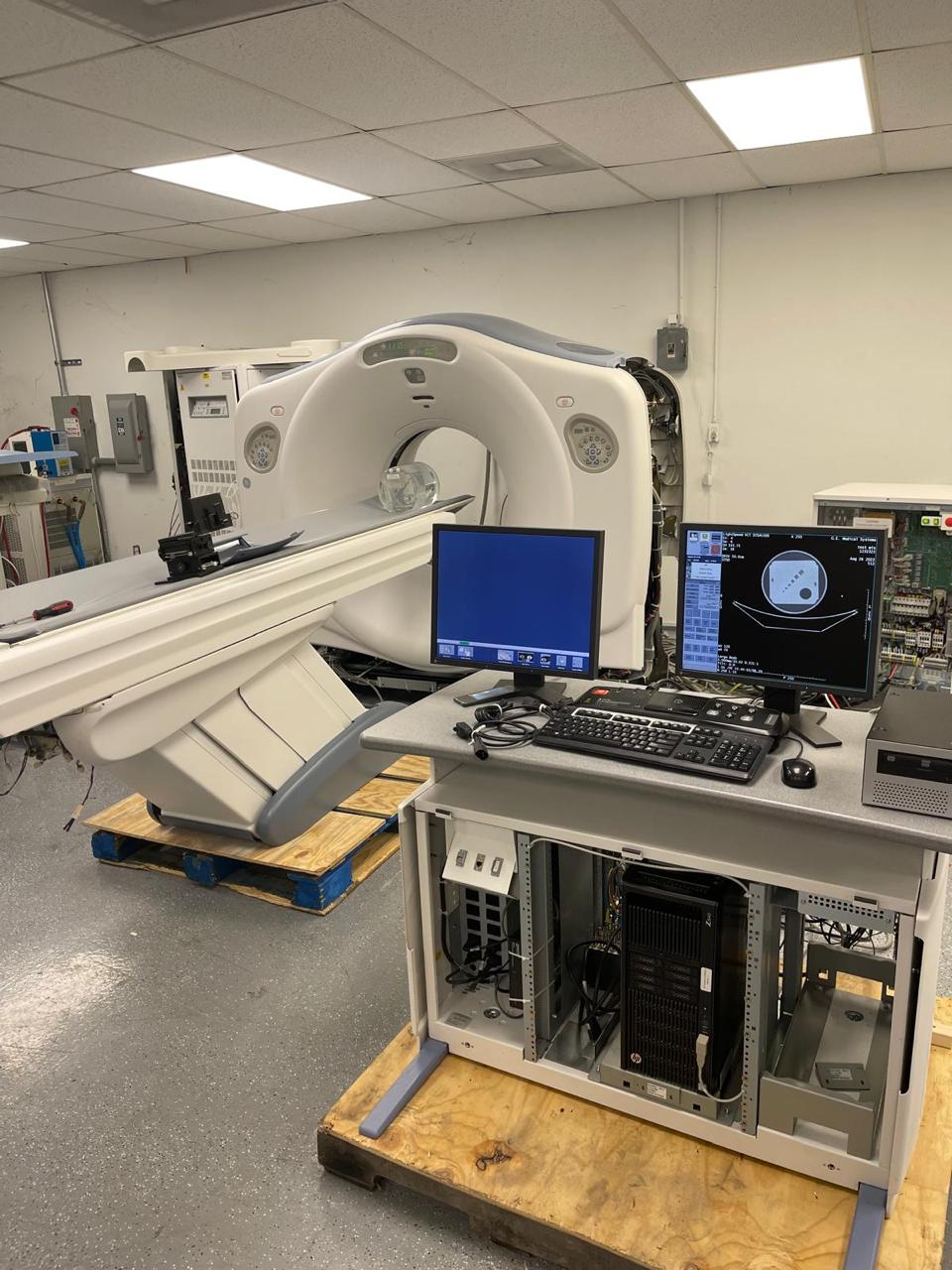 CT scanner and workstation during refurbished imaging system evaluation.