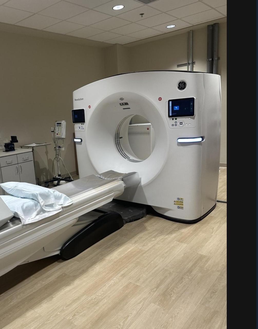 GE CT scanner image for repair-versus-replace decisions.