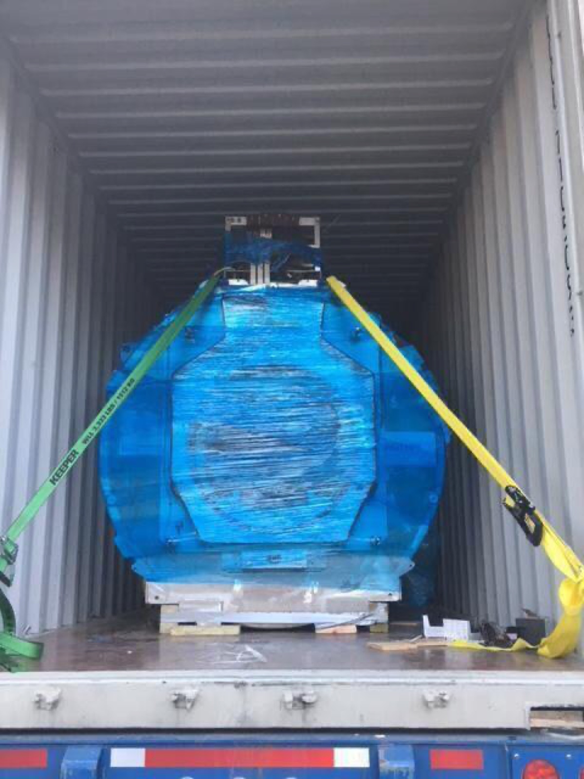 MRI system being loaded for equipment relocation and logistics work.